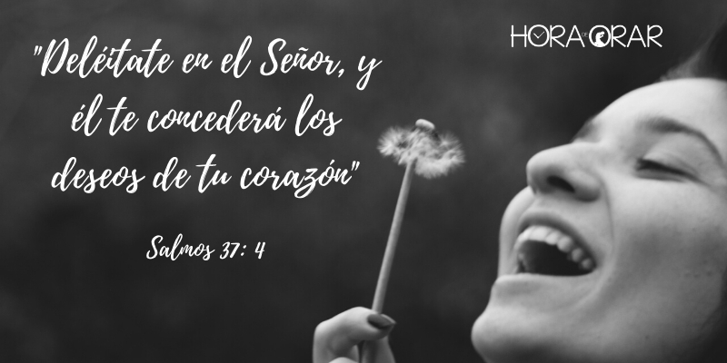 Mujer sopla una flor. Salmos 37:4